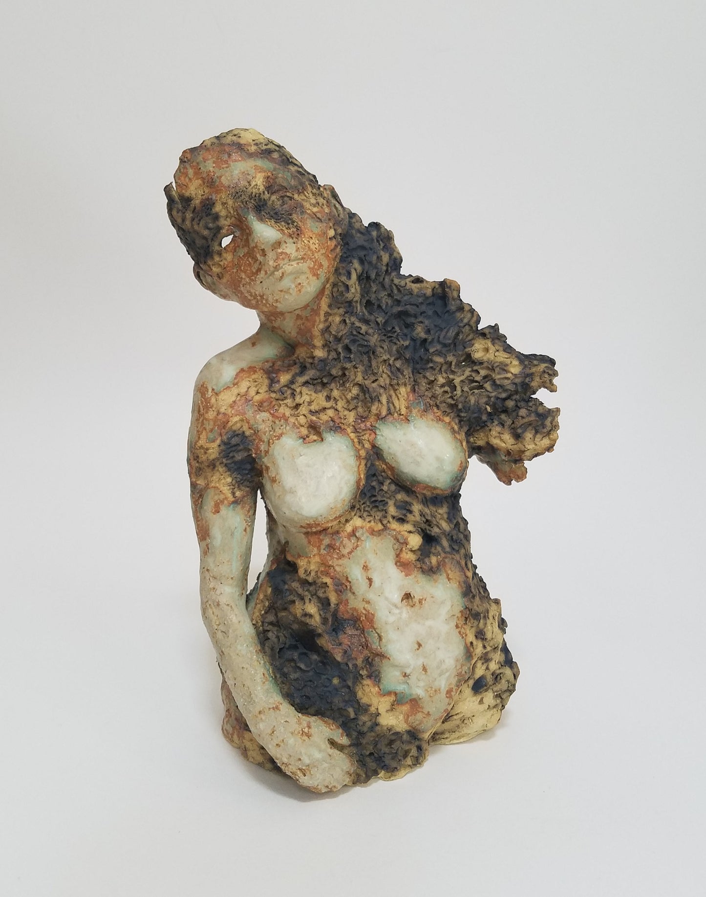 Ceramic figure sculpture, torso with texture and face